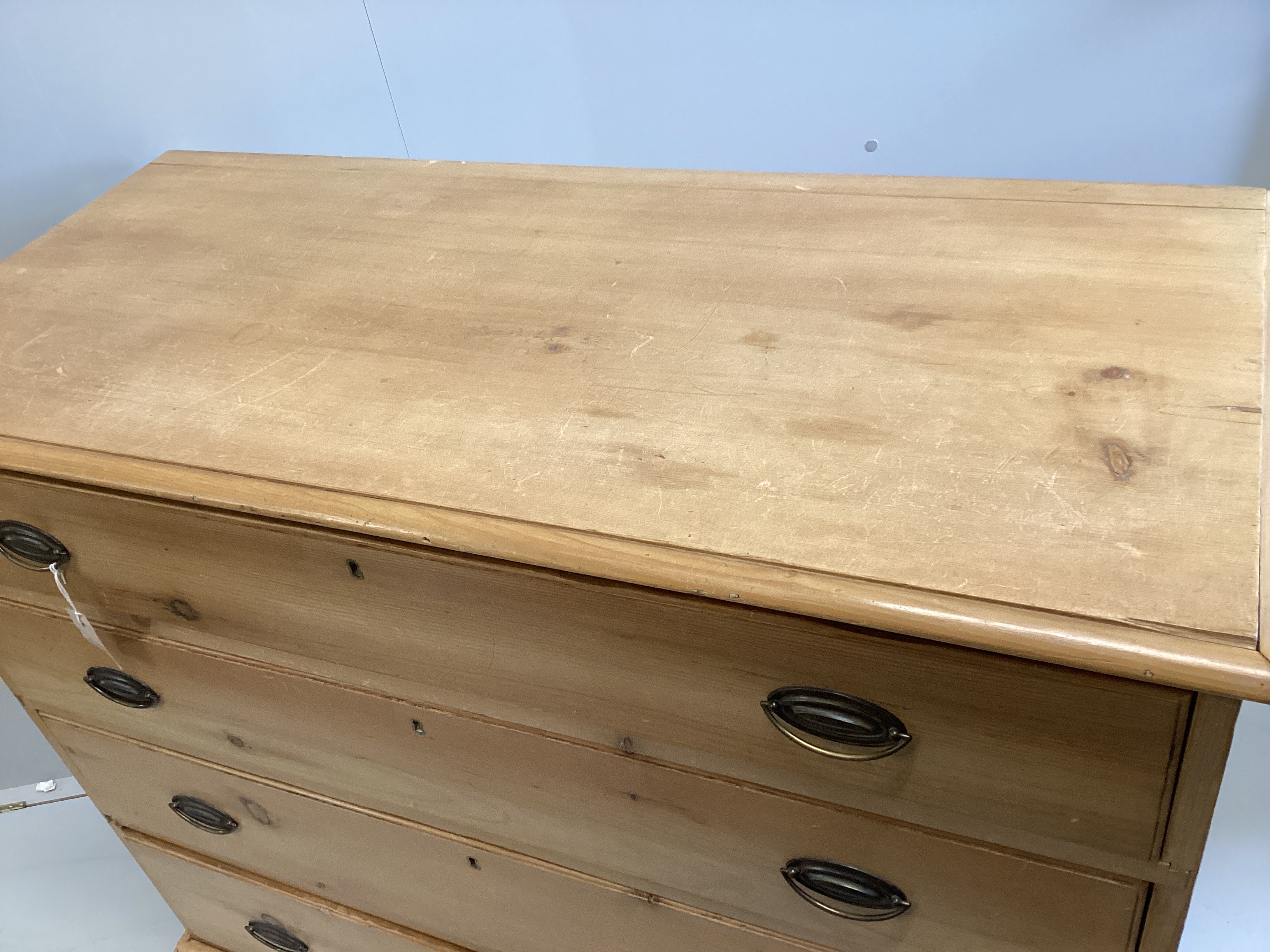 An early Victorian pine four drawer chest, width 122cm, depth 54cm, height 106cm